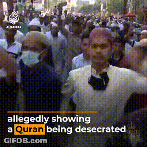 A Group Of People Are Allegedly Showing A Quran Being Desecated GIF