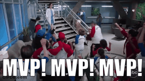 A Group Of People Are Celebrating With The Words Mvp ! Mvp ! Mvp ! Written Above Them GIF