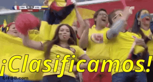 A Group Of People Are Cheering In A Stadium And They Are Wearing Yellow Shirts That Say Clasificamos ! GIF