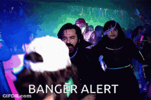 A Group Of People Are Dancing And Banger Alert Is Displayed On The Screen GIF