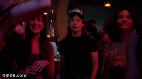 A Group Of People Are Dancing And The Word Schwing Is Visible GIF