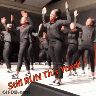 A Group Of People Are Dancing And The Words Still Run This Yard Are Visible GIF