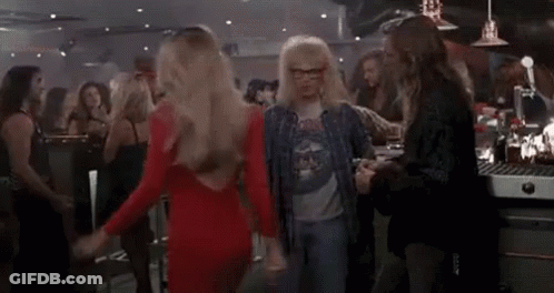A Group Of People Are Dancing In A Bar With The Word Schwing Written On The Bottom . GIF
