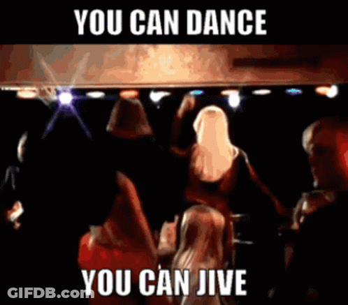 A Group Of People Are Dancing In A Dark Room With The Words " You Can Dance You Can Jive " Above Them GIF