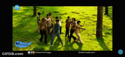 A Group Of People Are Dancing In A Field With A Pichuka Logo On The Bottom Left GIF