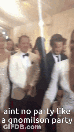 A Group Of People Are Dancing In A Room And The Caption Says Ain T No Party Like A Gnomeilson Party GIF