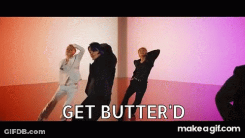 A Group Of People Are Dancing In A Room In A Video . GIF