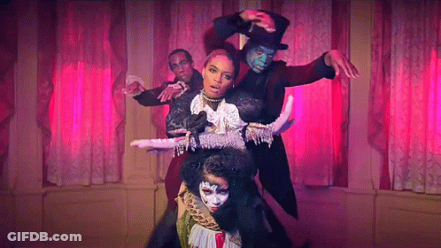 A Group Of People Are Dancing In A Room With Pink Curtains And A Woman In A Top Hat . GIF