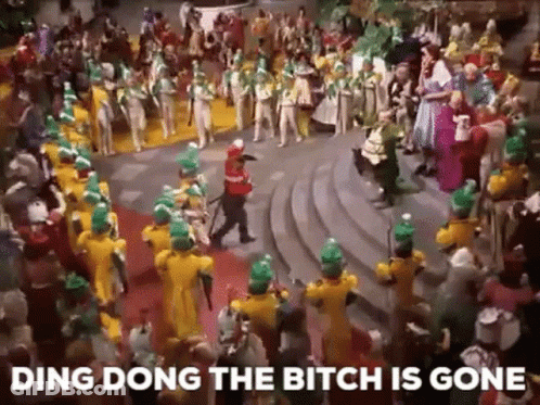 A Group Of People Are Dancing In A Room With The Words `` Ding Dong The Bitch Is Gone '' . GIF