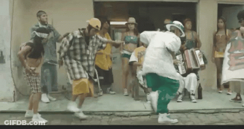 A Group Of People Are Dancing In Front Of A Building With A Sign That Says ' Aoc ' On It GIF