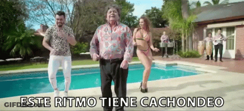 A Group Of People Are Dancing In Front Of A Swimming Pool With The Words Este Ritmo Tiene Cachondeo On The Bottom GIF