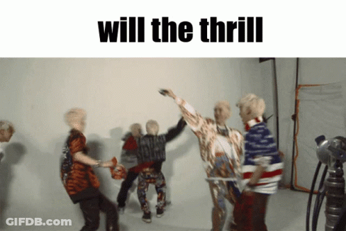 A Group Of People Are Dancing In Front Of A White Wall And The Words Will The Thrill Are Above Them GIF