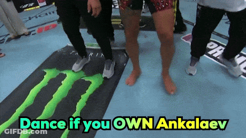 A Group Of People Are Dancing On A Monster Mat GIF