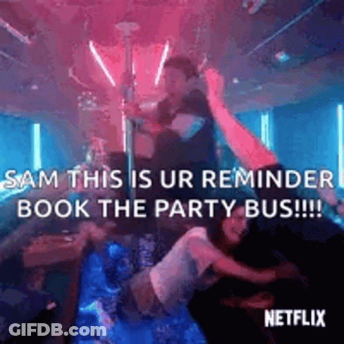 A Group Of People Are Dancing On A Pole In A Club And A Man Is Holding A Woman . GIF