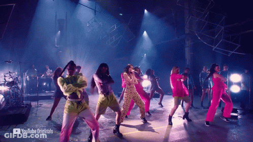 A Group Of People Are Dancing On A Stage With Youtube Originals In The Corner GIF
