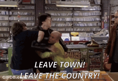 A Group Of People Are Fighting In A Store With The Words " Leave Town Leave The Country " Written On The Bottom GIF