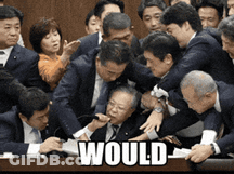 A Group Of People Are Gathered Around A Table With The Word Would Written On It GIF