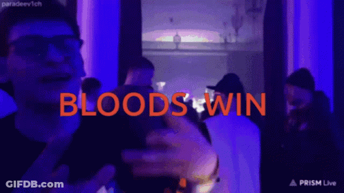A Group Of People Are Gathered In A Dark Room And The Words Bloods Win Are Displayed GIF