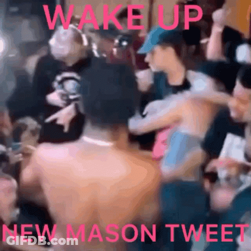A Group Of People Are Gathered In A Room With The Words Wake Up New Mason Tweet On The Bottom GIF