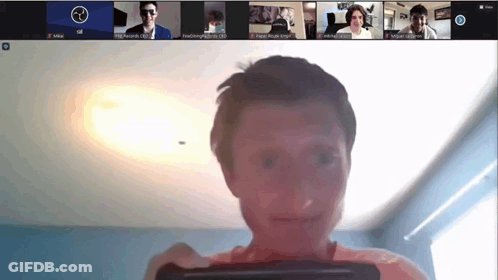 A Group Of People Are Having A Video Call And One Of Them Has A Smiley Face On His Face GIF