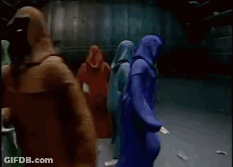 A Group Of People Are Holding Signs That Say Shadow Wizard And Money Gang . GIF