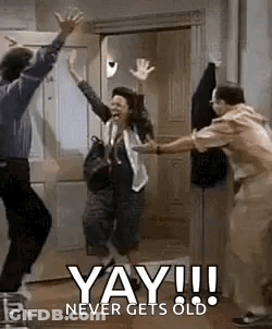 A Group Of People Are Jumping In The Air In Front Of A Door With The Words `` Yay !!! Never Gets Old '' . GIF
