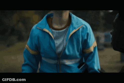 A Group Of People Are Kneeling In Front Of A Grave That Says Roy R Cole GIF