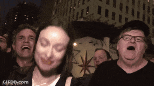 A Group Of People Are Laughing In Front Of A Building With Imgflip.com On The Bottom Right GIF