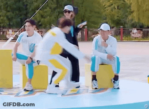 A Group Of People Are Playing A Game And One Of Them Is Jumping GIF
