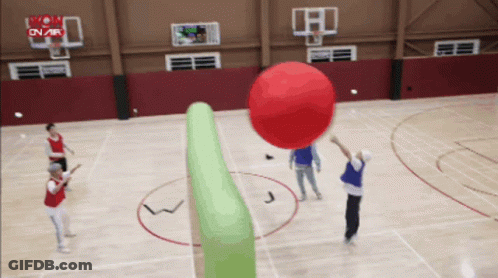 A Group Of People Are Playing A Game Of Dodgeball On A Basketball Court Sponsored By Mon On Air GIF