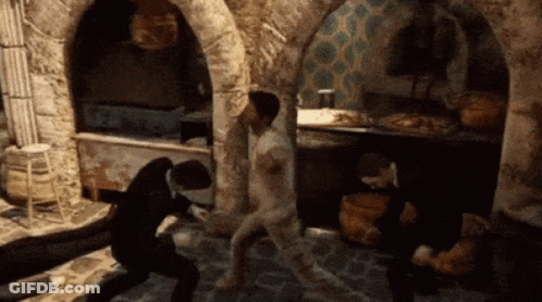 A Group Of People Are Playing A Video Game And One Man Is Naked GIF