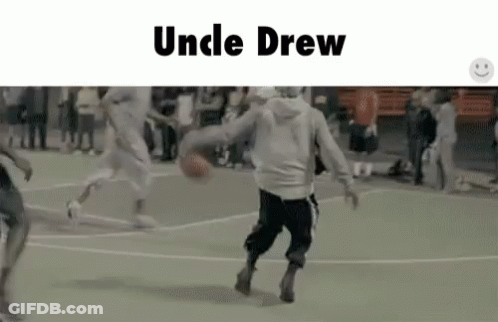 A Group Of People Are Playing Basketball On A Court With The Words `` Uncle Drew '' On The Bottom . GIF