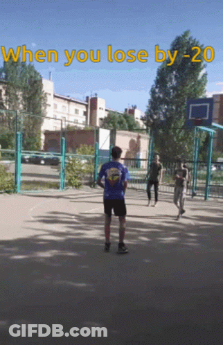 A Group Of People Are Playing Basketball On A Court With The Words When You Lose By -20 GIF