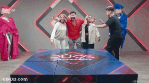 A Group Of People Are Posing For A Picture In Front Of A Sign That Says Duos Paradise GIF