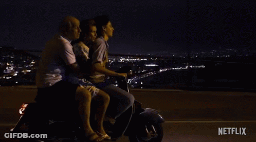 A Group Of People Are Riding A Scooter With The Words " Do N't Worry Mom " Written On The Bottom GIF