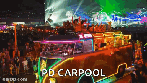 A Group Of People Are Riding On Top Of A Bus At A Festival . GIF