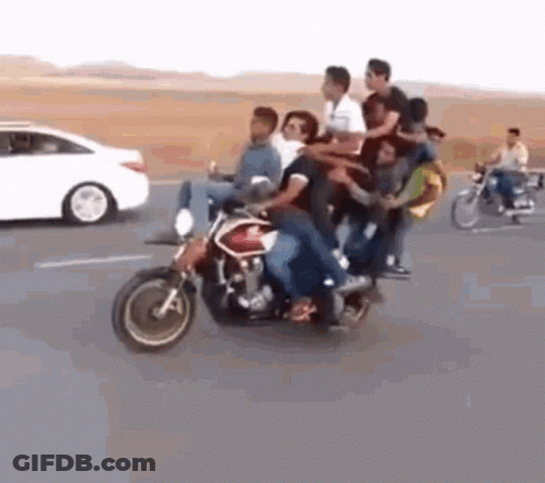 People Riding Motorcycle On Highway GIF