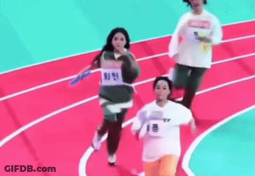 A Group Of People Are Running On A Track And One Of Them Is Wearing A Number 1 Shirt . GIF