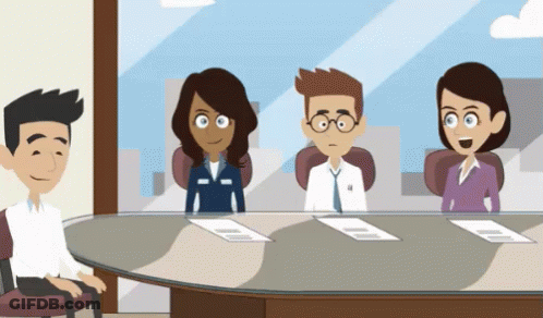 A Group Of People Are Sitting Around A Table GIF