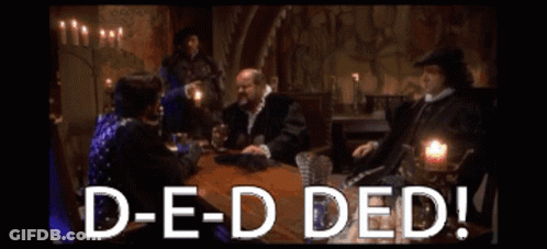 A Group Of People Are Sitting Around A Table With The Words D-E-D Ded GIF