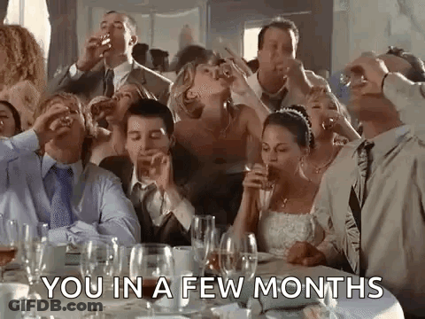 A Group Of People Are Sitting At A Table Drinking Wine And Toasting . GIF