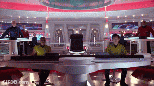 A Group Of People Are Sitting At A Table With The Word Ign On The Bottom Right GIF