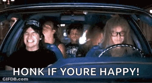 A Group Of People Are Sitting In A Car With The Words `` Honk If You 'Re Happy ! '' GIF