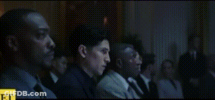 People Sitting In Dark Movie Theater GIF