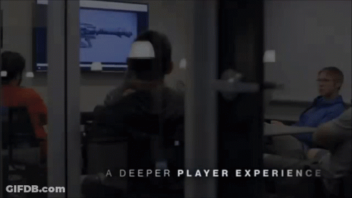 A Group Of People Are Sitting In A Room With The Words A Deeper Player Experience GIF