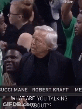 A Group Of People Are Sitting In A Stadium Watching A Basketball Game And One Of Them Is Asking What Are You Talking Abo GIF