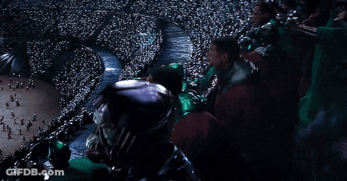 Group Sitting In Stadium With Open Mouths GIF