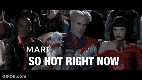 A Group Of People Are Sitting In A Theater And One Of Them Is Holding A Dog And Says Marc So Hot Right Now GIF