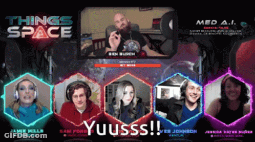A Group Of People Are Sitting In Front Of A Screen With Things Space Written On It GIF