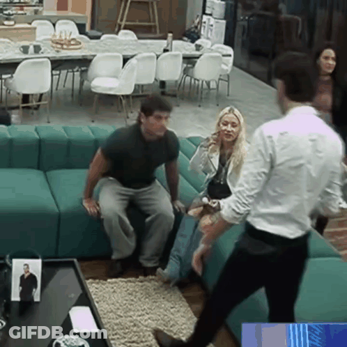 A Group Of People Are Sitting On A Green Couch GIF